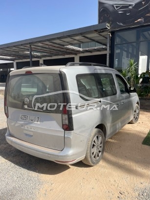 فولكزفاكن كاددي Utilitaire avec vitres et sieges مستعملة 2428443